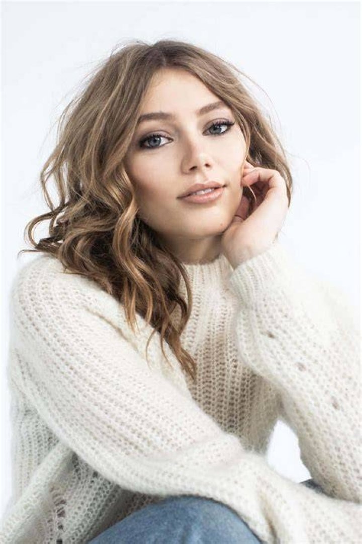 Grace Van Dien posing for a photo shoot. 
