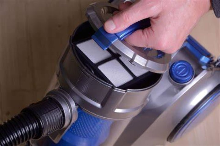 How do I change the filter in my Eureka vacuum?