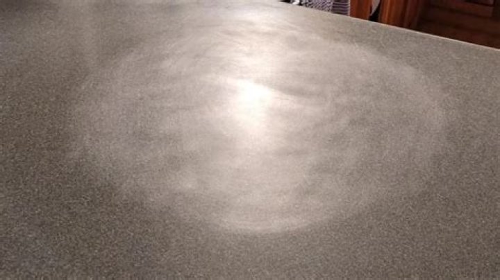How do you fix burn marks on Corian?