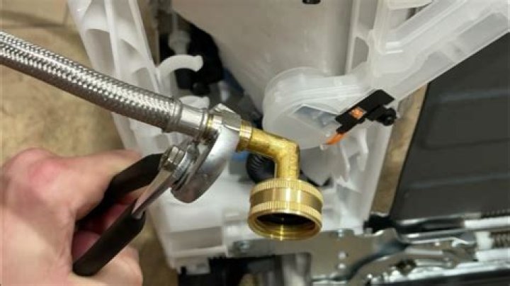 How do you install a dishwasher water line?