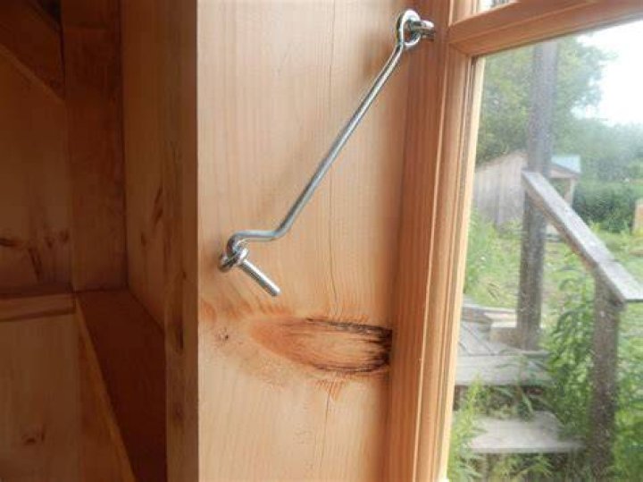 How do you install a hook and eye latch?