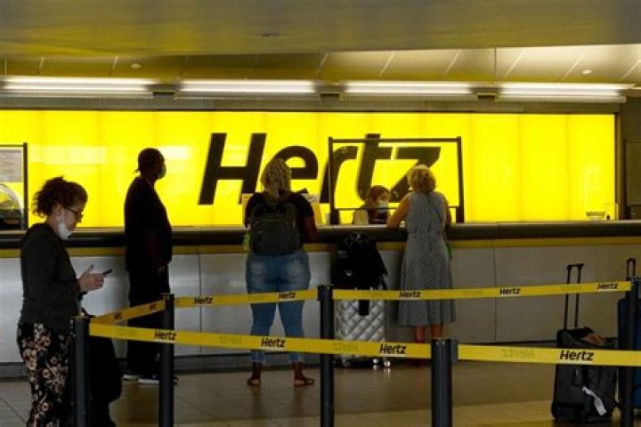 How long will Hertz hold my reservation?
