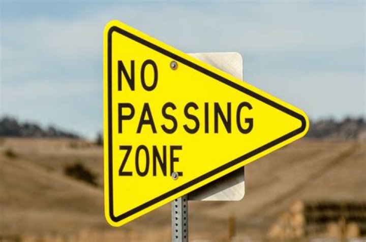 What does a no passing sign look like?