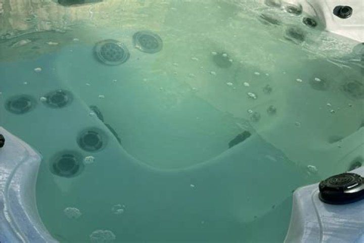 Why does a hot tub go green?